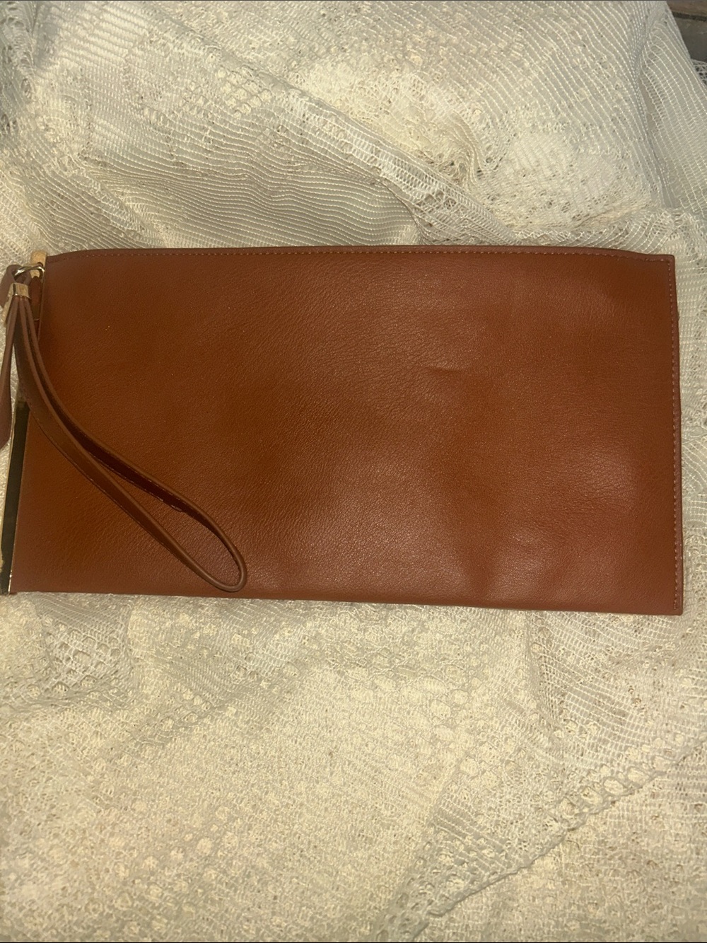 Classic caramel colored Faux leather wristlet, or clutch